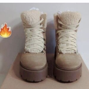 Steve MaddenReyen Suede Faux Shearling Cold Weather Lug Sole Platforms booties.